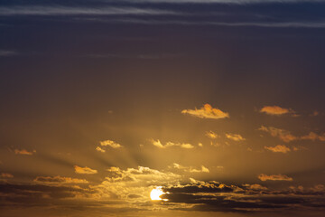 Colorful sunrise with clouds over the sea