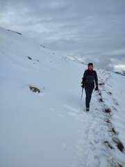 Nevicata nel parco del Beigua. Passo del Faiallo, Liguria. Alpinista in escursione