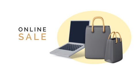 Online shopping concept. Laptop with black paper shop bags