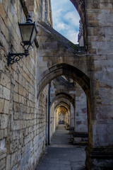 Fototapeta na wymiar A row of arches along the side of Winchester Cathedral in Hampshire, UK