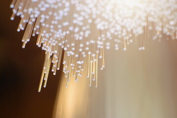 Optical fibre, golden lights abstract background