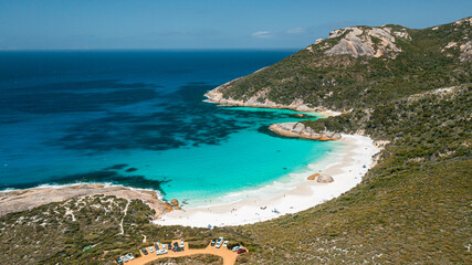 Aerial shot of turquoise colour water, little beach, and car park in Two Peoples Bay, Albany,...