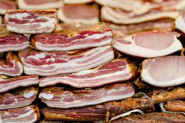 Selection of assorted home made meats, jerky and sausages on a farmers market in Vilnius, Lithuania