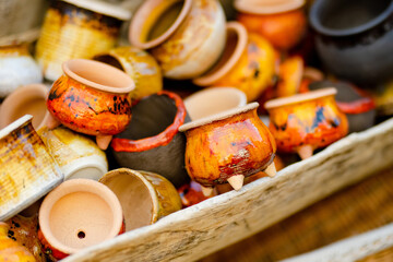 Obraz na płótnie Canvas Ceramic dishes, tableware and jugs sold on Easter market in Vilnius