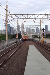 Fototapeta premium KRL Commuterline, or known as Commuterline, is a commuter rail system for Greater Jakarta in Indonesia. It was previously known as KRL Jabodetabek. It is operated by PT KAI Commuter Indonesia
