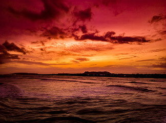 Naklejka na ściany i meble sunset on the beach, Beautiful orange sky atmosphere on Seashore