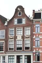 Fototapeta na wymiar Amsterdam Canal House with Bell Gable and 1658 Inscription, Netherlands