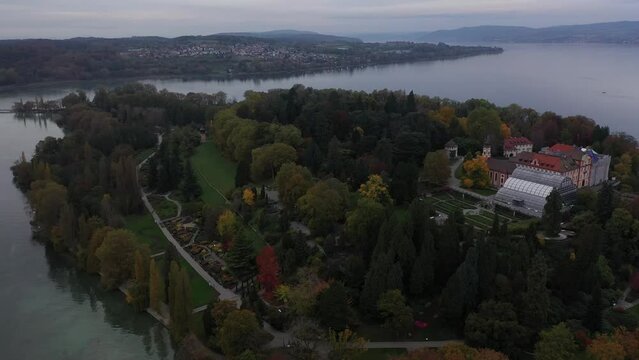 Flightover at a little siland on a lake.