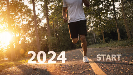 Young man asia running and sprinting on the road with new year 2024 text concept