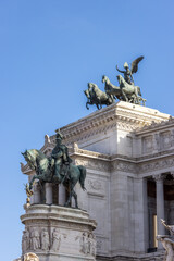 Historical Sculptures in the city of Rome, Italy. Altar of the Fatherland. Sunny and cloudy sky.