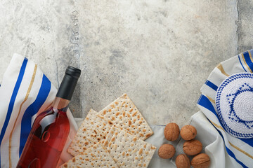 Passover celebration concept. Matzah, red kosher and walnut. Traditional ritual Jewish bread...