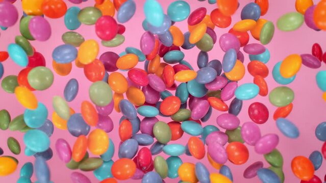Super Slow Motion Shot of Sweet Colorful Lentils Flying and Rotating Towards Camera at 1000fps.