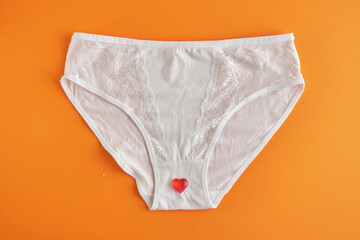 hearts and white woman panties, woman health and love yourself concept