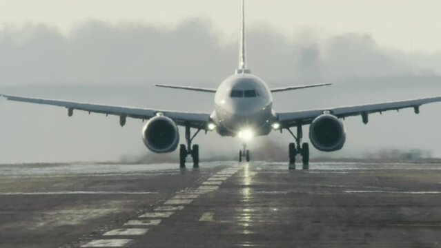 Camera Follows Commercial Jet Taking Off With Landing Gear Retracting