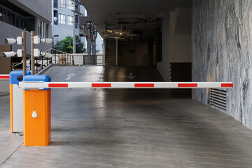 car park barrier with recoding CCTV camera, automatic entry system.
