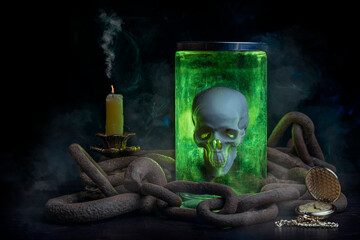 Glowing magic skull in a jar on a wooden table chained. Smoke comes from a candle, an old clock has...