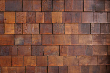 wooden roof shingle tile background and texture. timber decorates the wall. varnished wooden panel.