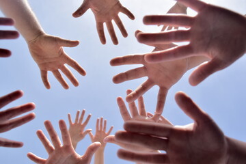 Many hands in the sky. Together we are stronger