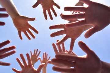 Many hands in the sky. Together we are stronger