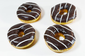 Chocolate brownies donuts isolate on white background top view.