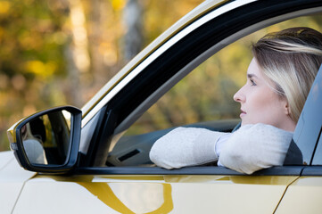 Young woman in the car. © Tomasz Warszewski