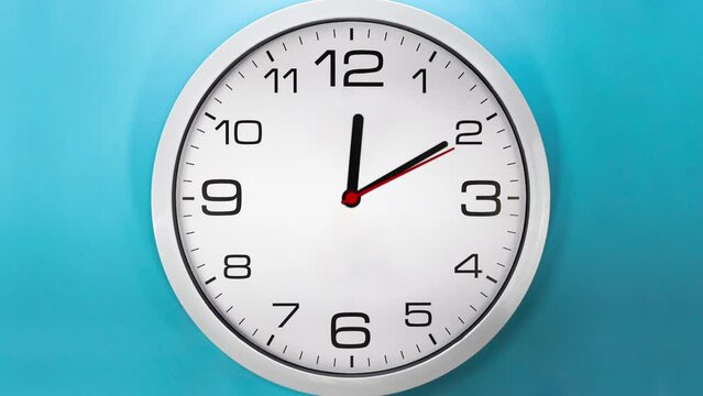 Time-lapse clock on blue background. expedited version of the one hour period.