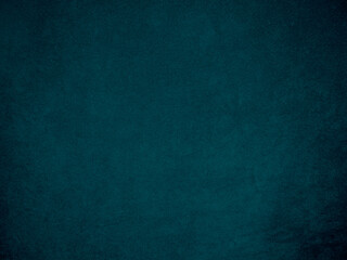 Dark blue velvet fabric texture used as background. Tone color blue cloth  background of soft and smooth textile material. There is space for text and for all types of design work..