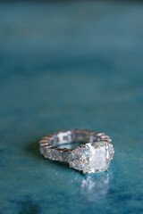 Diamond ring on blue background,wedding ring.