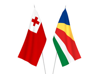 National fabric flags of Seychelles and Kingdom of Tonga isolated on white background. 3d rendering illustration.