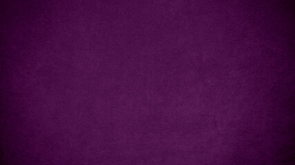 Dark purple velvet fabric texture used as background. Tone color purple cloth  background of soft and smooth textile material. There is space for text and for all types of design work..