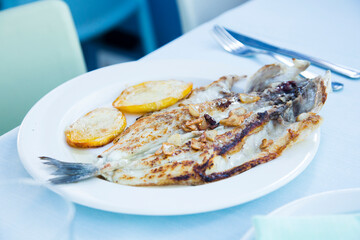 Grilled sole. Grilled fish in a restaurant on the Spanish coast.