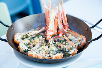 Scampi Prawns cooked in the oven with parsley and garlic.