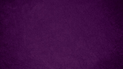 Dark purple velvet fabric texture used as background. Tone color purple cloth  background of soft and smooth textile material. There is space for text and for all types of design work..