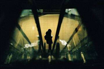 Silhouette of a girl in a mall