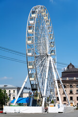 Ferris wheel. Ferris wheel in the city square. Attraction for tourists