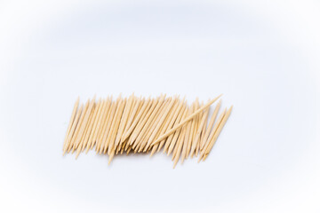 Toothpicks in the center of the image on white background