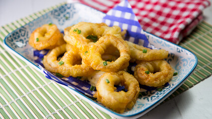 Roman squid rings. Battered squid, traditional Spanish tapa recipe.