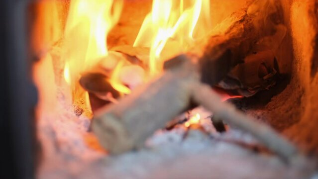 burning firewoods in an oven fire-box
