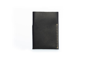 Black leather wallet on a button on a white background. Card holder. Top view