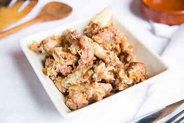 Chipirones Fritos. Deep fried Baby Squid. Traditional Spanish tapa recipe.