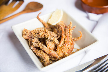 Chipirones Fritos. Deep fried Baby Squid. Traditional Spanish tapa recipe.