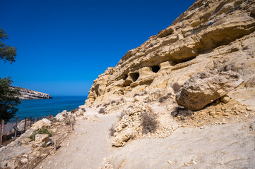 Famous Matala beach with caves, known for hippies in the 70's.
