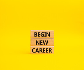 Begin new career symbol. Concept word Begin new career on wooden blocks. Beautiful yellow background. Business and Begin new career concept. Copy space