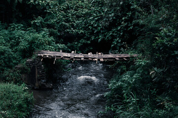 view of the river with the water flowing fast after the rain fell in the afternoon
