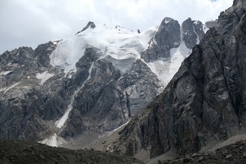 Scenery of Tian Shan Mountains during trekking in Altyn Arashan Valley to beautiful glacier....