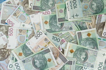 Polish zloty banknotes. PLN zł or złoty, the official currency of Poland. One, two and five hundred złotych notes, paper bills.