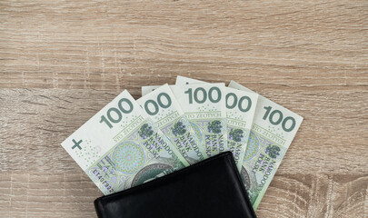 100 Polish zloty banknotes. PLN zł or złoty, the official currency of Poland. One hundred...