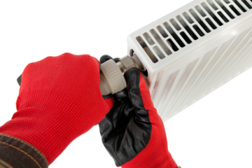 technician tightening central heating radiator fitting, close-up on isolated white