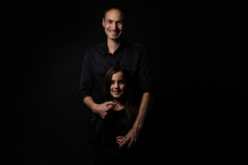Loving daddy look at little adorable daughter feeling love isolated on studio background profile faces side view, deep devotion warm relationships, love care, closest person, fathers day concept