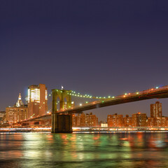 Fototapeta na wymiar View of Brooklin Bridge in New York City at night.